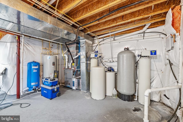 unfinished basement with water heater and heating unit