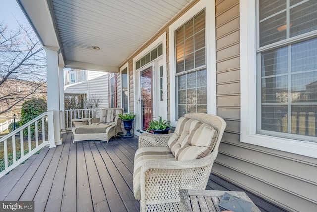 wooden deck featuring a porch