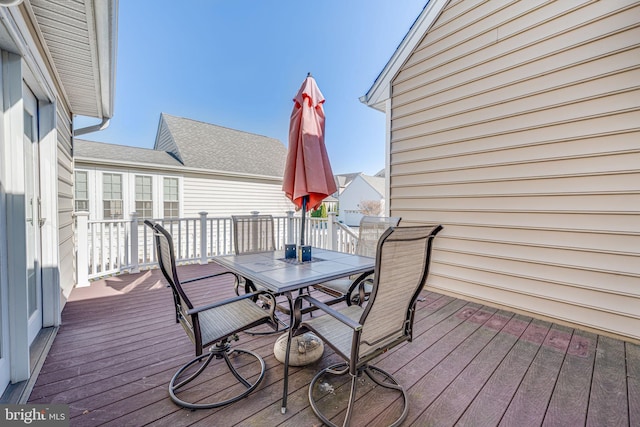 deck featuring outdoor dining area