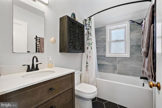 full bathroom featuring tile patterned flooring, toilet, vanity, and shower / bathtub combination with curtain