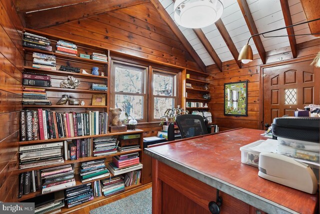 office space with lofted ceiling with beams, wooden walls, and wooden ceiling