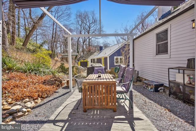 view of patio with outdoor dining area