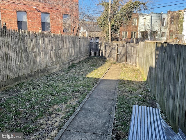 view of yard featuring a fenced backyard