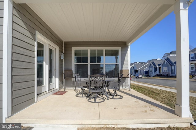 view of patio with a residential view