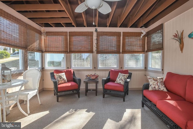 sunroom with ceiling fan