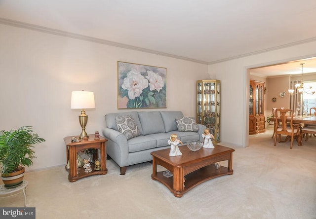 living area with light colored carpet, an inviting chandelier, and crown molding