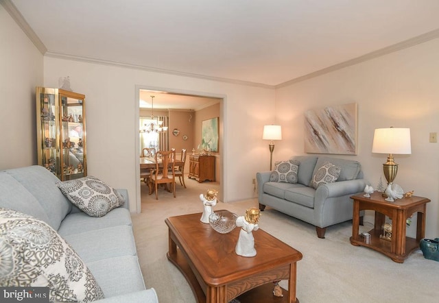 living area featuring light colored carpet, a chandelier, and ornamental molding