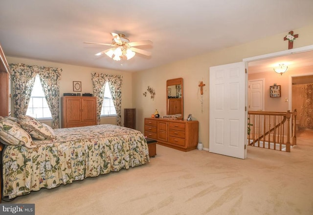 bedroom featuring ceiling fan and carpet floors