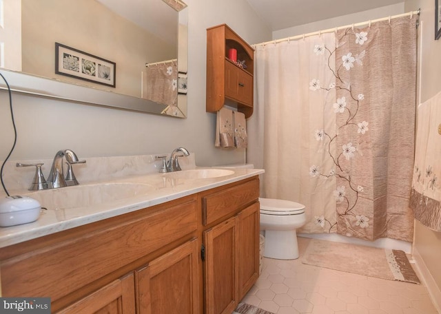 full bath with tile patterned floors, toilet, vanity, and a shower with curtain