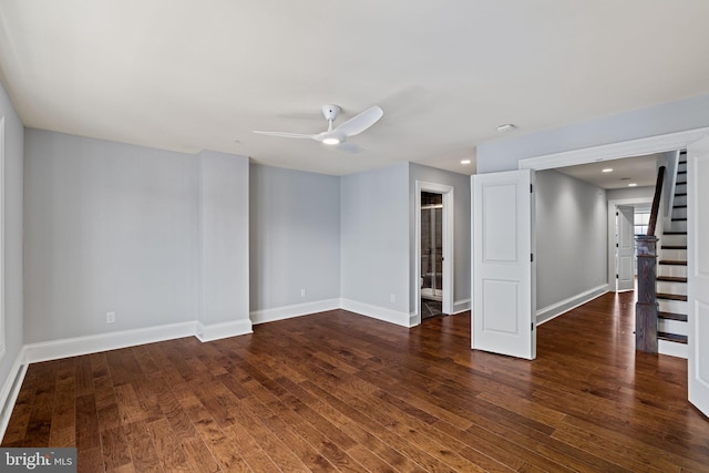 unfurnished room with recessed lighting, stairway, a ceiling fan, wood finished floors, and baseboards