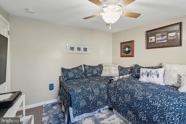 bedroom with baseboards, a ceiling fan, and carpet flooring