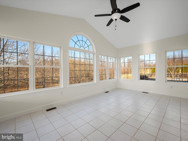 unfurnished sunroom with a ceiling fan, lofted ceiling, and visible vents