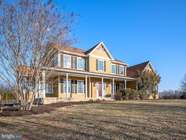 view of front of home featuring a porch and a front yard