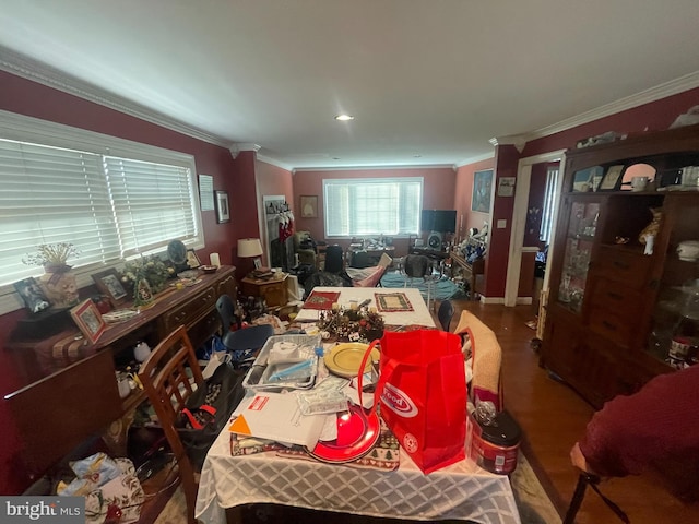 dining area featuring crown molding