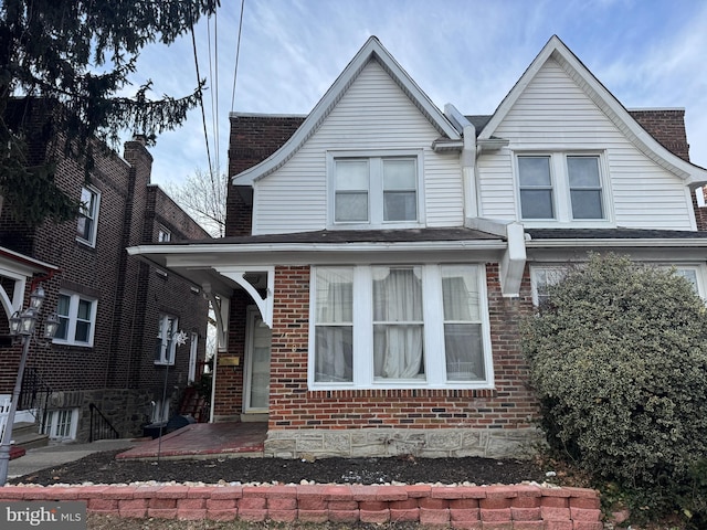 view of front of property with brick siding