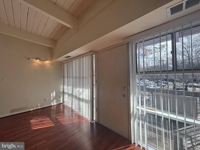 interior space with wood ceiling, visible vents, lofted ceiling with beams, and wood finished floors