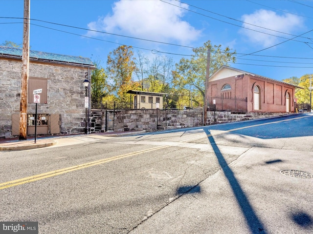 view of street with curbs and sidewalks