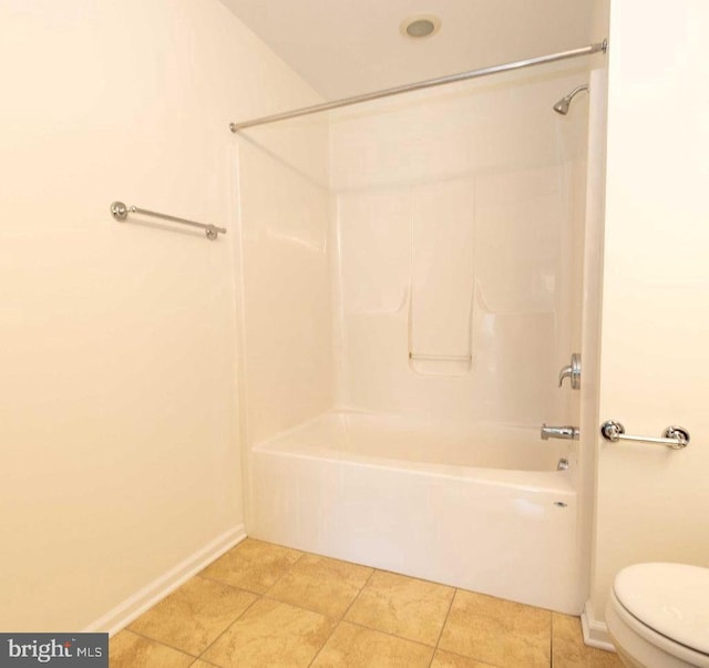 full bath featuring  shower combination, baseboards, toilet, and tile patterned floors