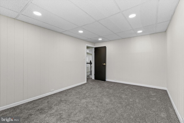 unfurnished room with carpet floors, recessed lighting, and a drop ceiling