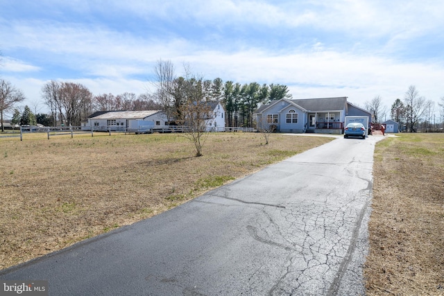 view of road featuring driveway