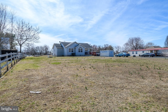 view of yard featuring fence