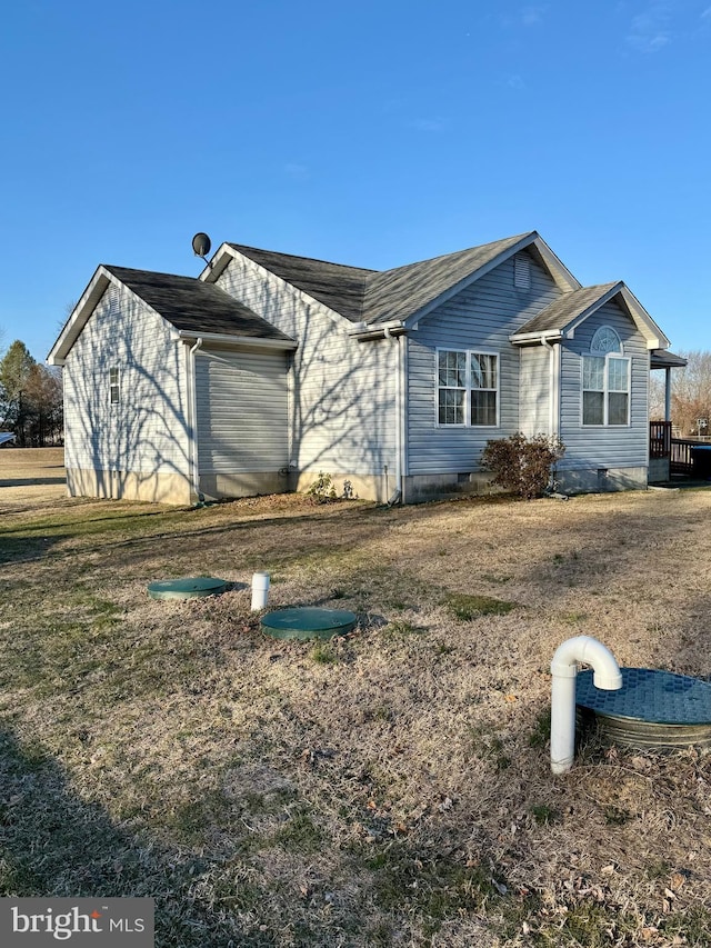 exterior space with crawl space