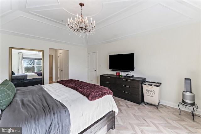 bedroom featuring an inviting chandelier and baseboards