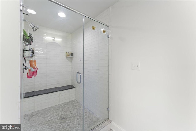 full bathroom with a shower stall