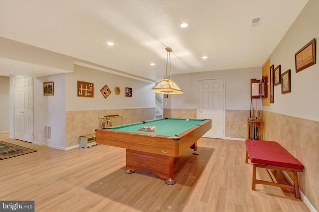 recreation room featuring billiards, visible vents, wood finished floors, and wainscoting