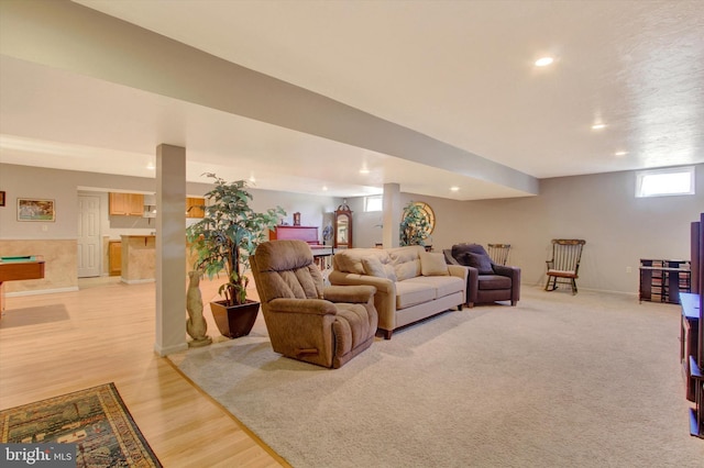 living room featuring billiards, light wood-style flooring, and recessed lighting