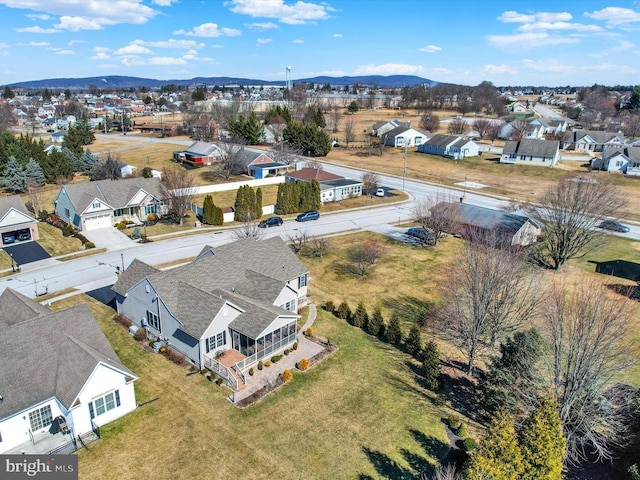 birds eye view of property featuring a residential view and a mountain view