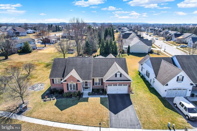 drone / aerial view with a residential view