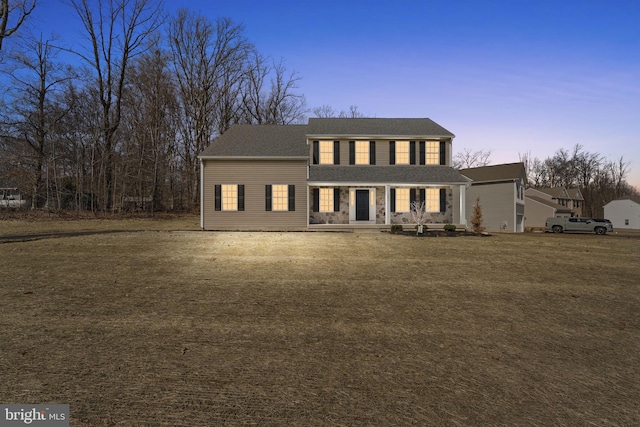 view of front of house featuring a lawn