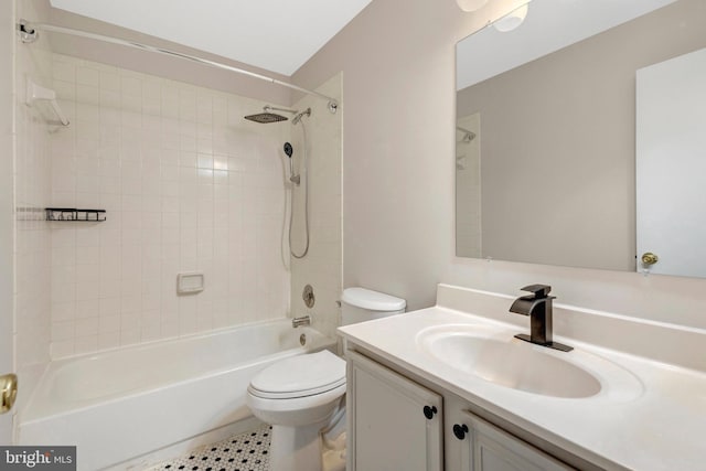 full bathroom featuring shower / tub combination, vanity, and toilet