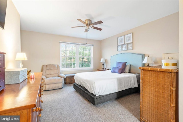 bedroom featuring carpet and ceiling fan