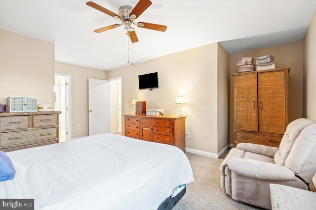 bedroom featuring baseboards, carpet floors, and ceiling fan