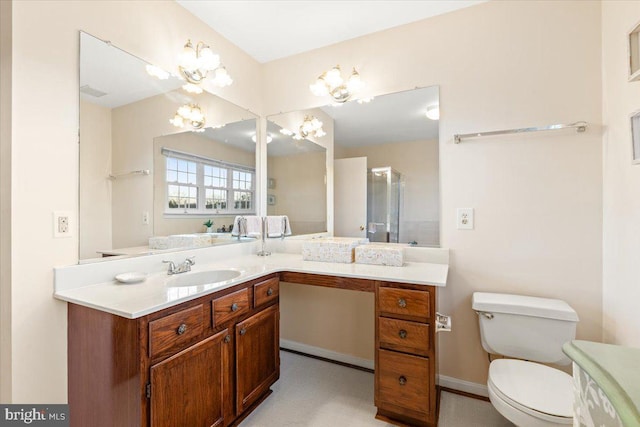 bathroom with toilet and vanity