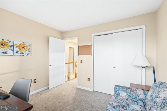 office area featuring baseboards and carpet floors