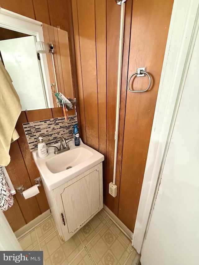 bathroom featuring backsplash, vanity, and tile patterned floors