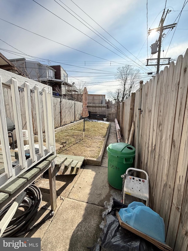 view of yard featuring a fenced backyard and a patio