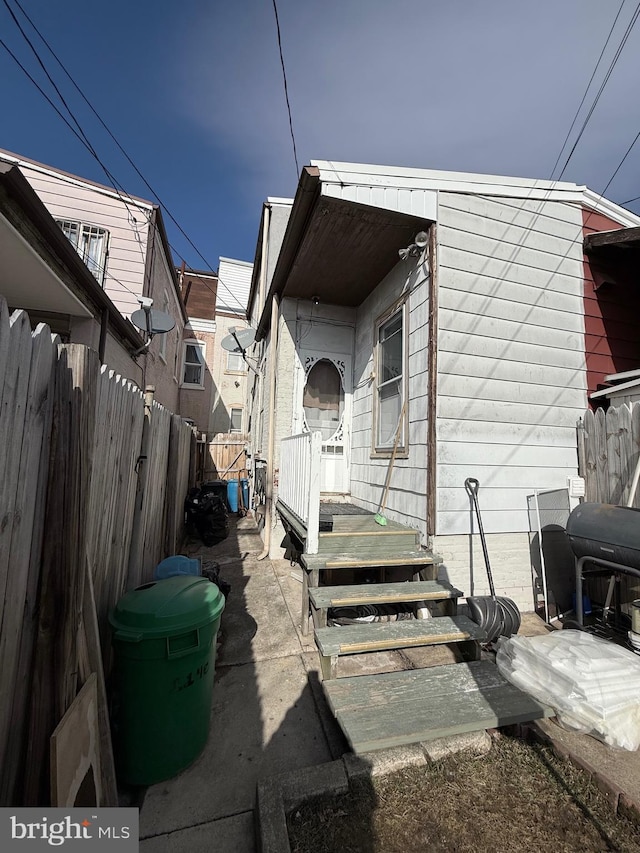 exterior space with a patio area and fence