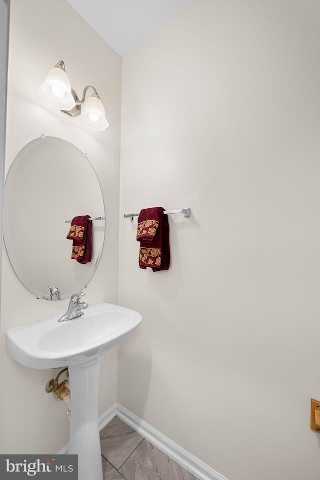 bathroom featuring baseboards