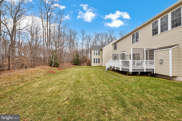 view of yard featuring a deck