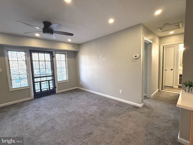 empty room with baseboards, dark carpet, a ceiling fan, and recessed lighting