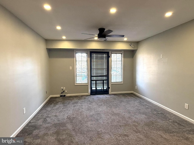 unfurnished room featuring ceiling fan, dark colored carpet, recessed lighting, and baseboards