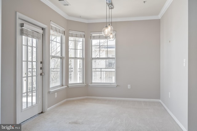 interior space with plenty of natural light, visible vents, crown molding, and carpet