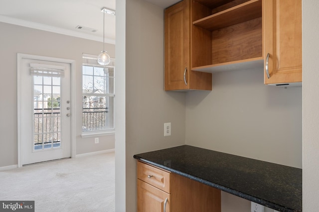 kitchen with visible vents, baseboards, light colored carpet, ornamental molding, and open shelves