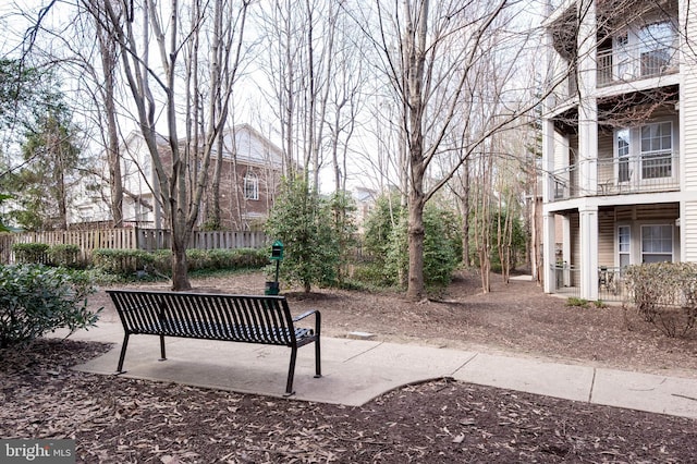 view of community with fence