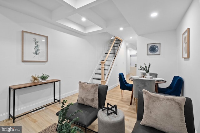 living area with light wood-style floors, baseboards, recessed lighting, and stairway
