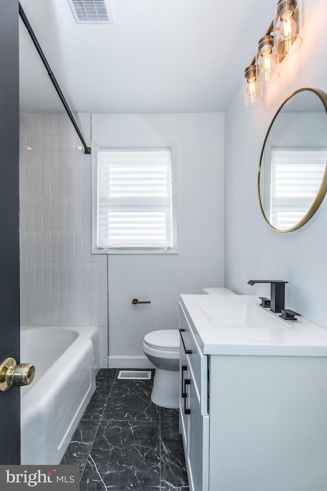 full bathroom featuring shower / tub combination, toilet, vanity, visible vents, and marble finish floor